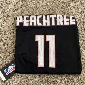 Brand new Nike trae young peach tree jersey